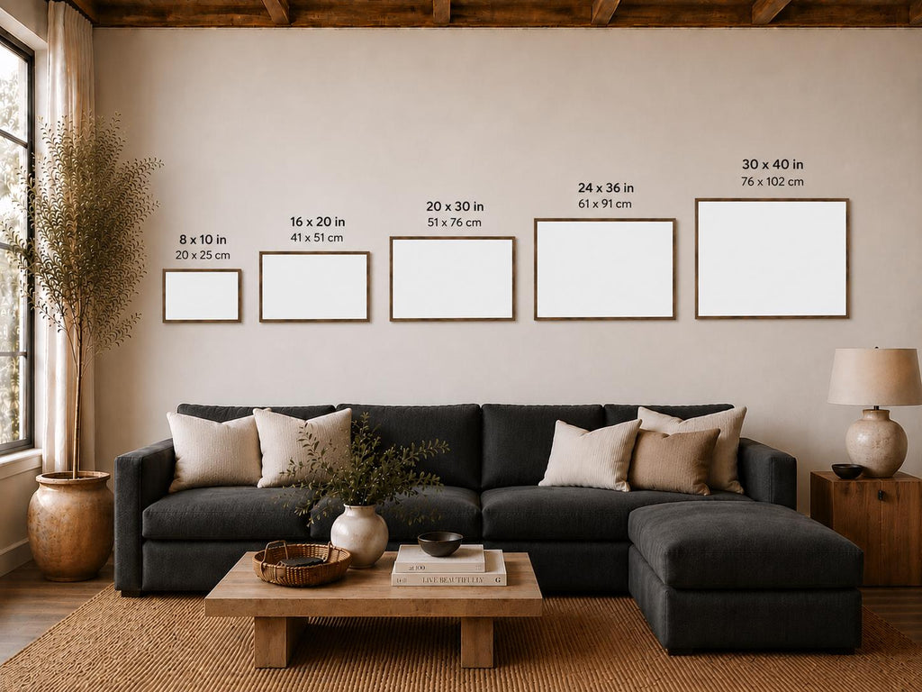 May include: Five rectangular wall frames with white centers and thin brown borders, arranged horizontally above a dark gray sectional sofa. Sizes labeled include 8x10 in, 16x20 in, 20x30 in, 24x36 in, and 30x40 in, providing a visual scale for wall art.