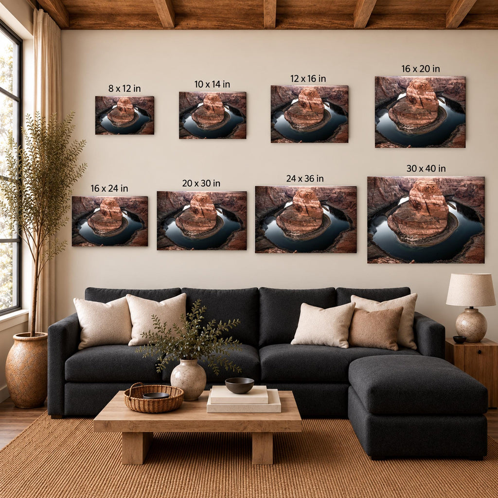 Horseshoe Bend canvas size guide above a charcoal sofa: 8 x 12, 10 x 14, 12 x 16, 16 x 20, 16 x 24, 20 x 30, 24 x 36, and 30 x 40 inches. Eight landscape canvases show the different sizes and crops.
